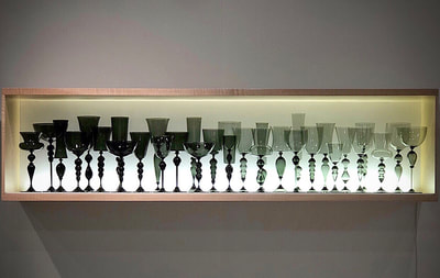 Hand blown glass gradient goblet sculpture collections by artist Michael Schunke